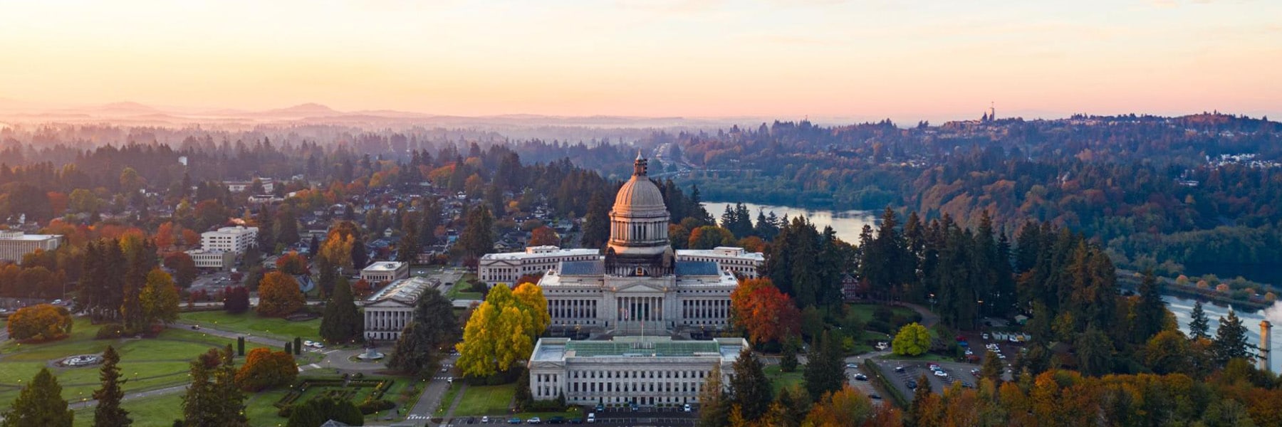 Aerial view of capitol building and surrounding landscape.